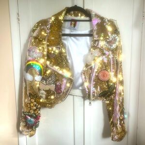 Nathalia Gaviria, rose gold, sequin jacket.